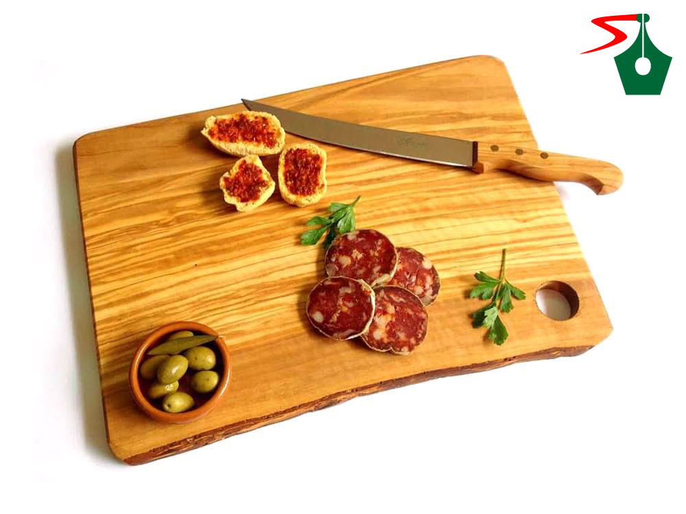 Irregular shaped rustic olive wood chopping board