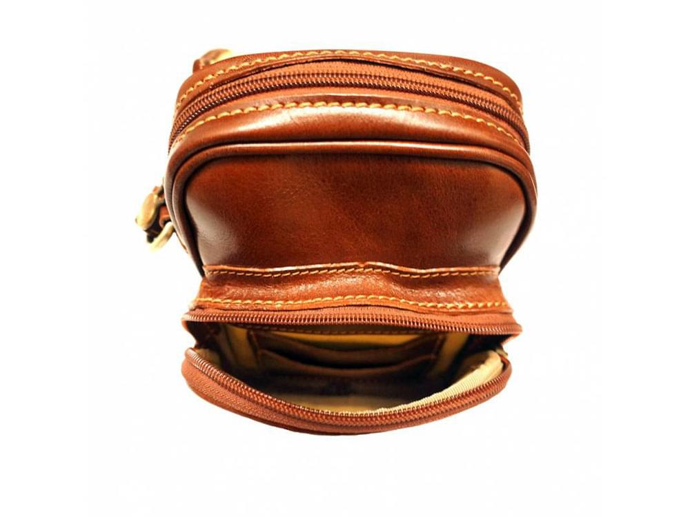 Atri - compact Italian leather bag - showing inside the front compartment