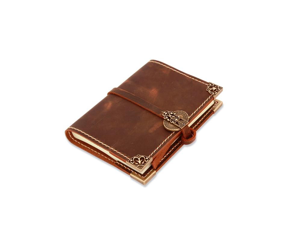 Handmade leather and bronze journals in four sizes
